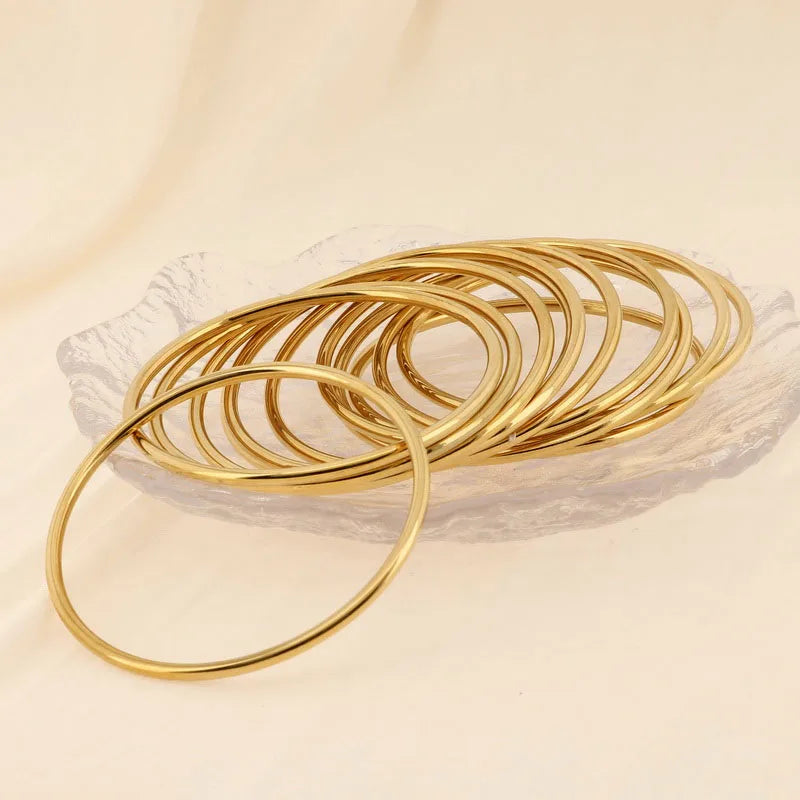 Lot de Bracelets Joncs Dorés – Empilables Chic & Intemporels