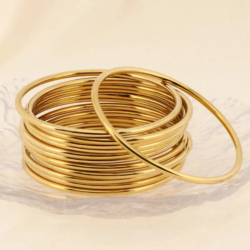 Lot de Bracelets Joncs Dorés – Empilables Chic & Intemporels